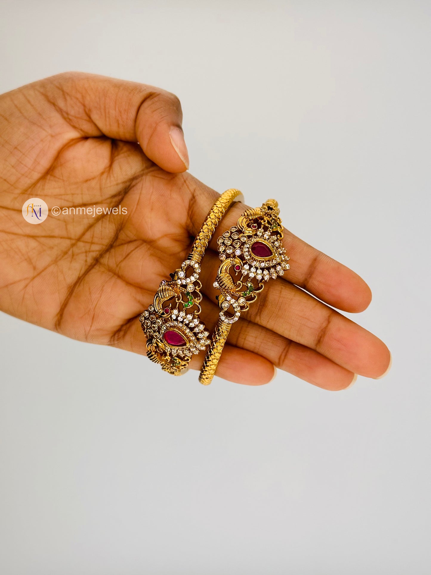 Kundan stone matte finish peacock design bangle set