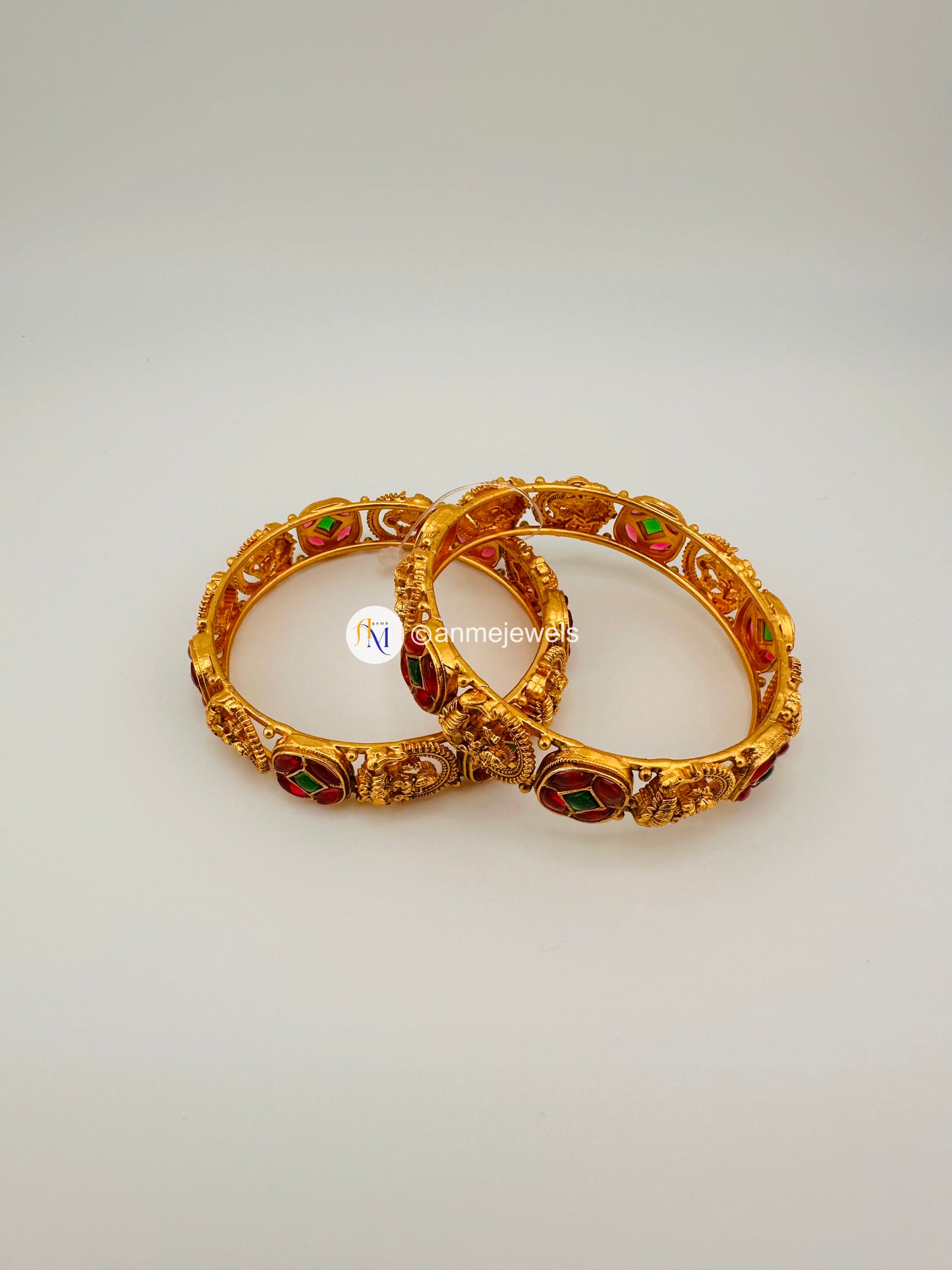 Antique Matte finish ruby and green kemp and lakshmi design bangle set