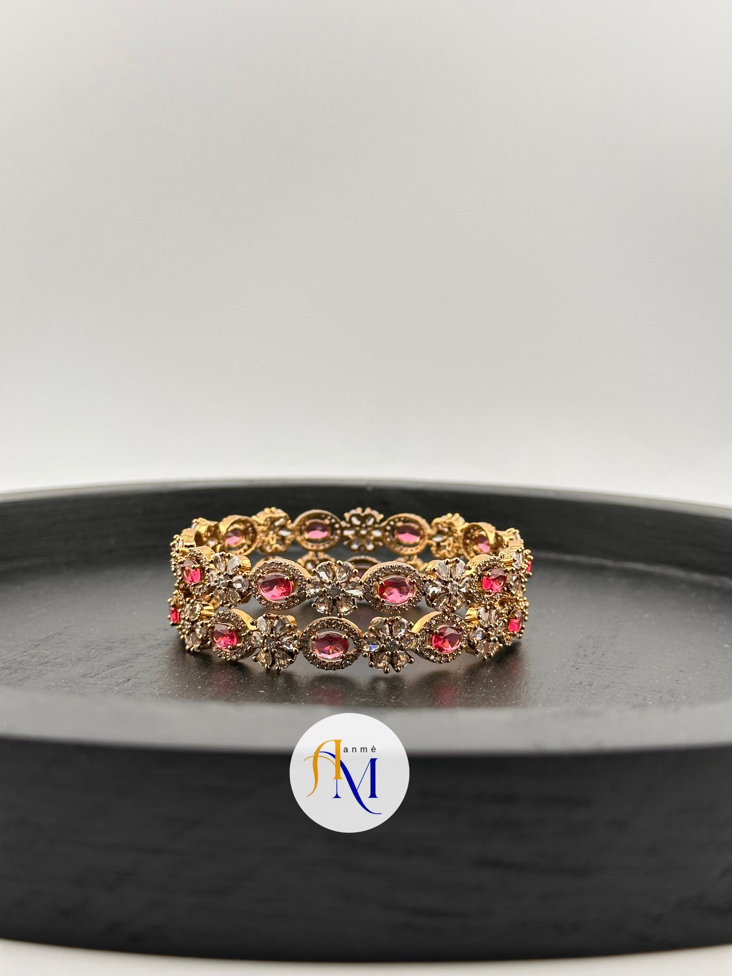 Matte finish AD bangles with white flowers and Ruby, Emerald, Sapphire and Natural Pink stones