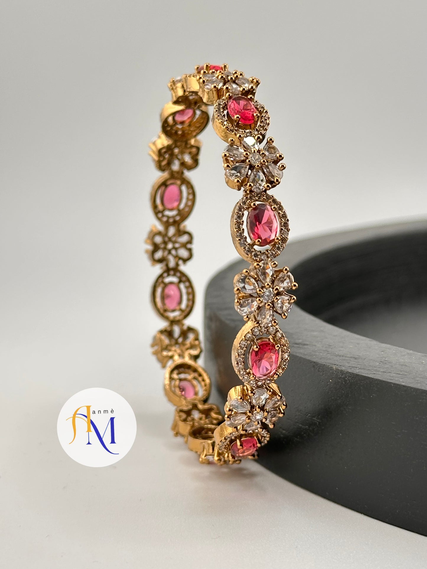 Matte finish AD bangles with white flowers and Ruby, Emerald, Sapphire and Natural Pink stones