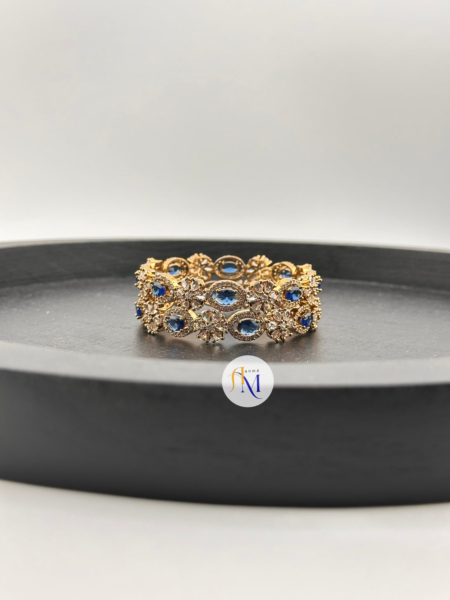 Matte finish AD bangles with white flowers and Ruby, Emerald, Sapphire and Natural Pink stones