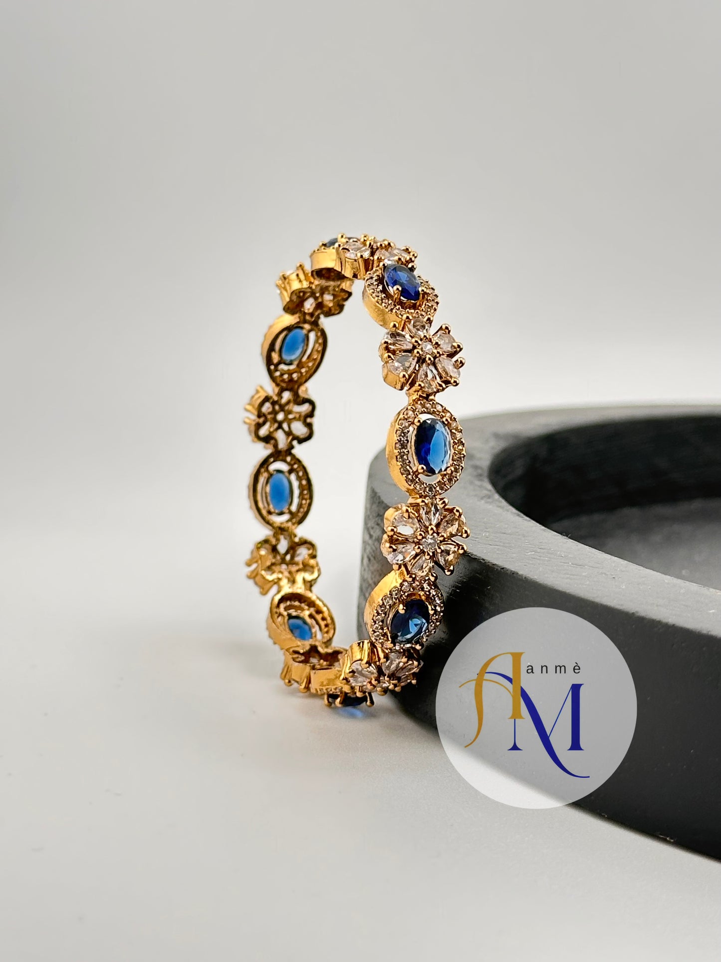 Matte finish AD bangles with white flowers and Ruby, Emerald, Sapphire and Natural Pink stones