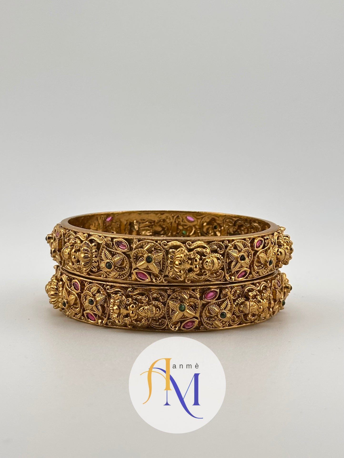 Antique Laksmi and floral design with ruby and green stone bangles(Set of 2)