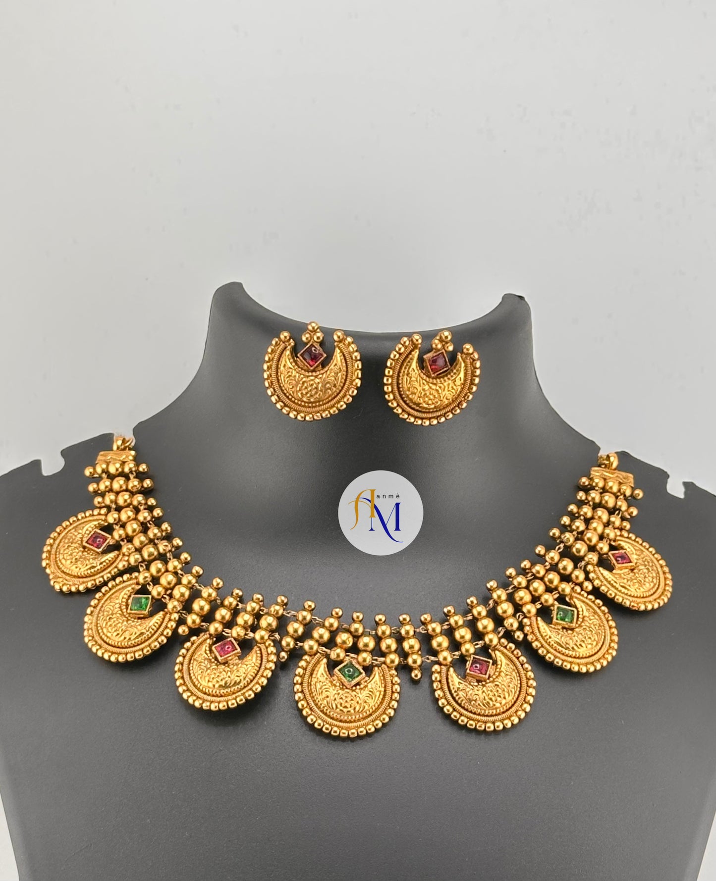 Unique chand design with ruby-green-white stones necklace set