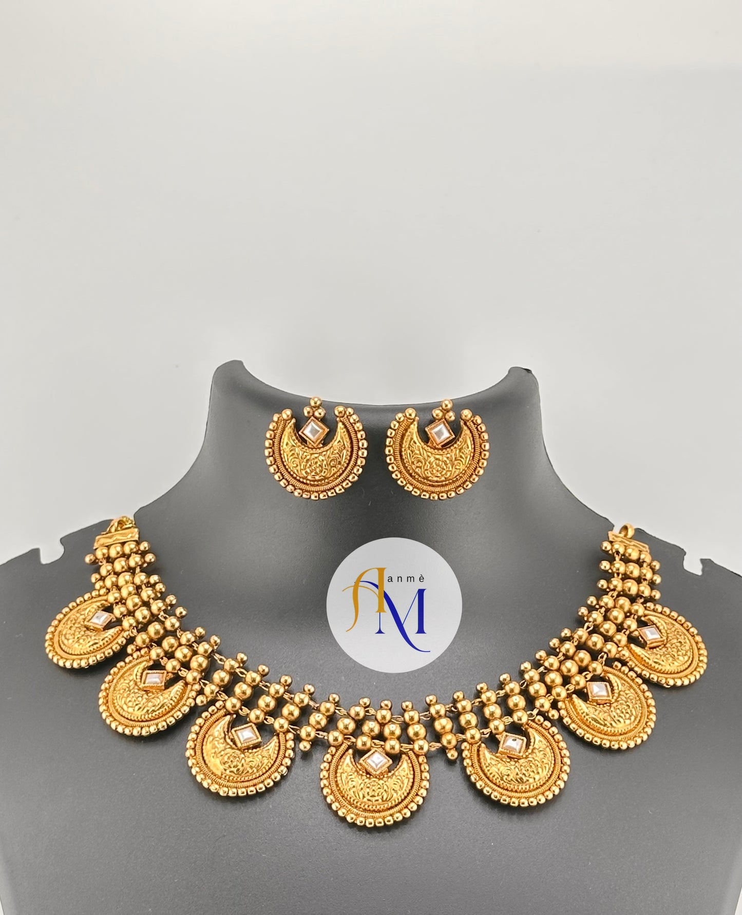Unique chand design with ruby-green-white stones necklace set