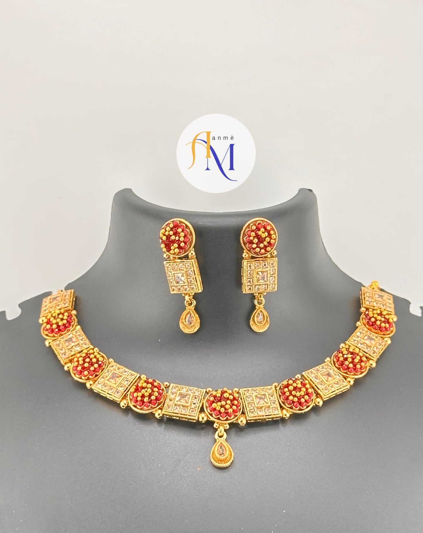 Beautiful Maroon Stone Studded Gold-Toned Choker Necklace Set with matching Earrings