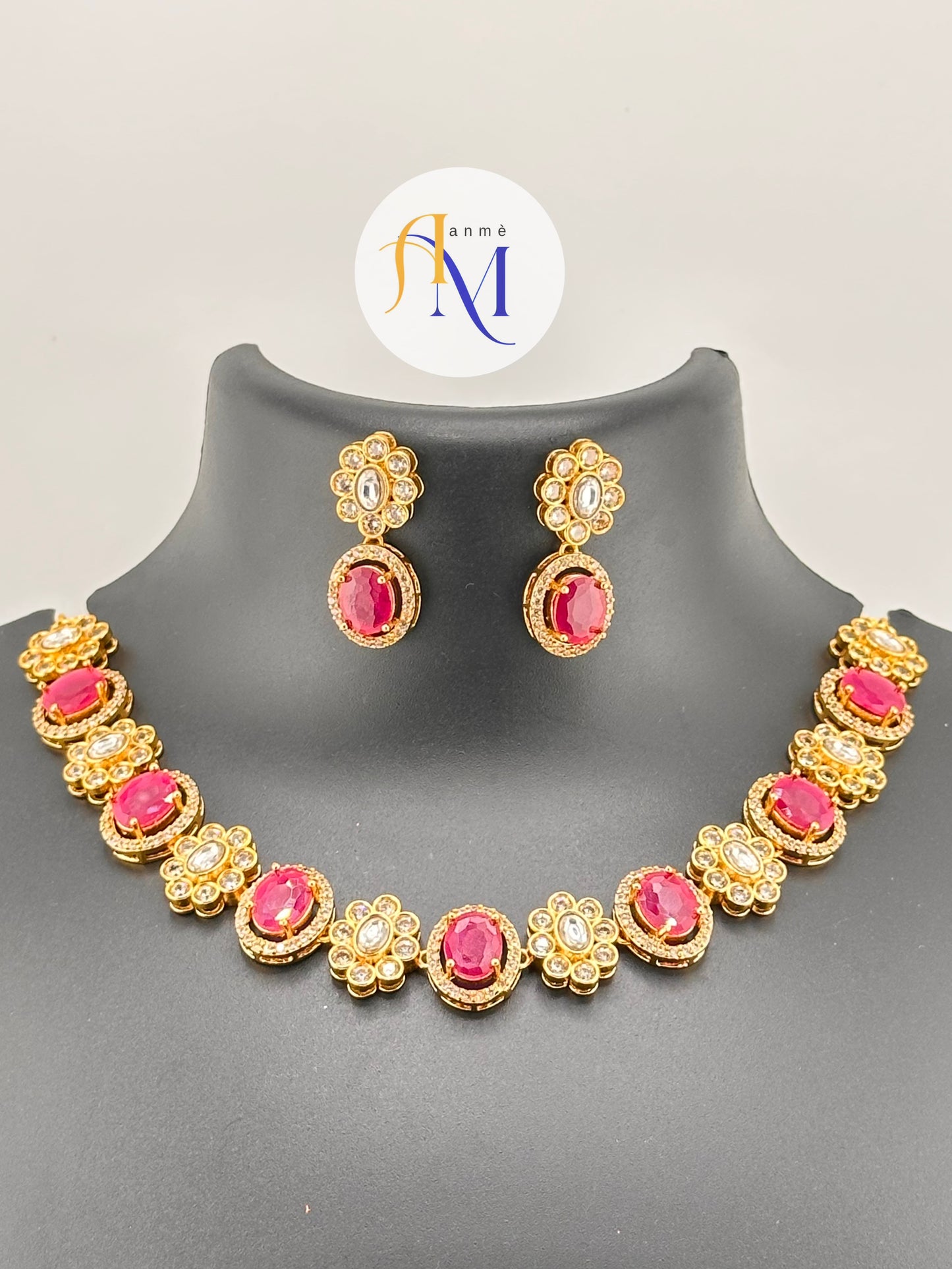 Beautiful ruby-toned AD necklace and earring set
