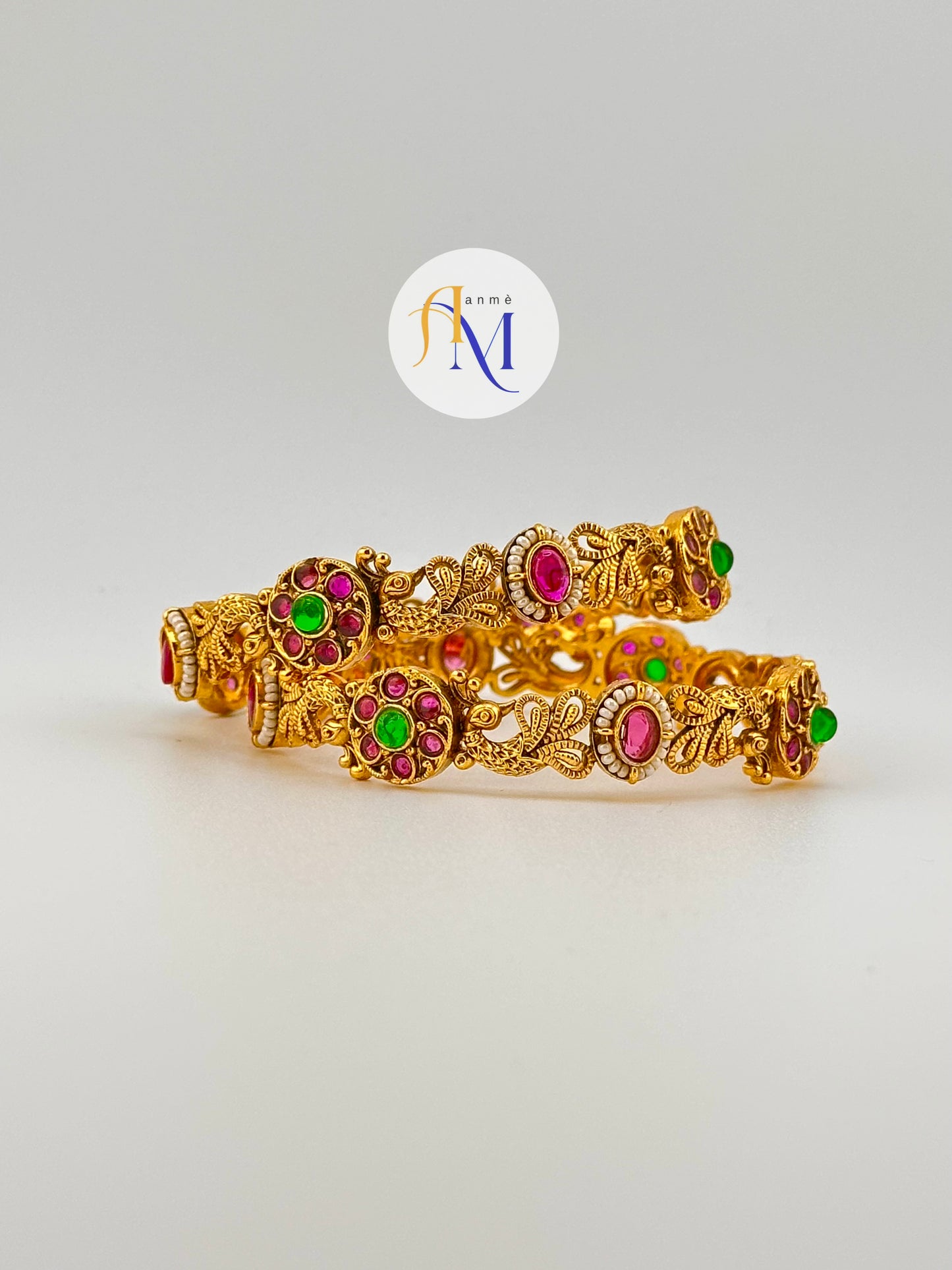 Beautiful Peacock and floral design with ruby-green stone bangles(Set of 2)