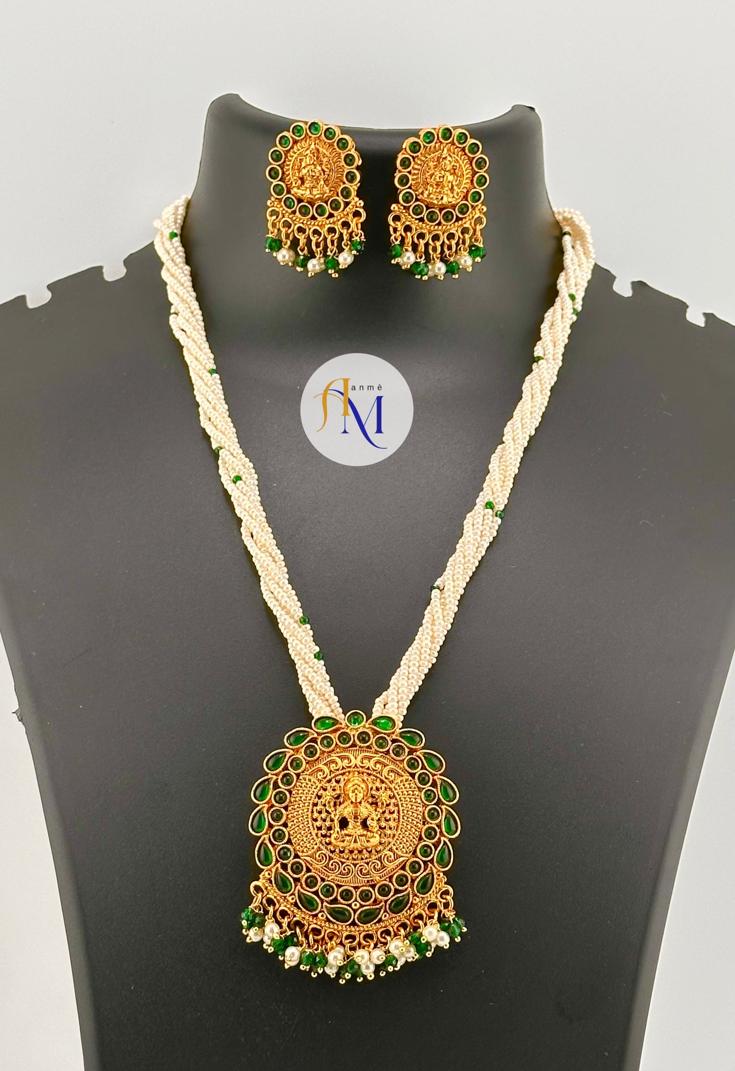 Pretty looking pearl chain long harams with golden lakshmi pendant with earrings(Available in 2 colors)
