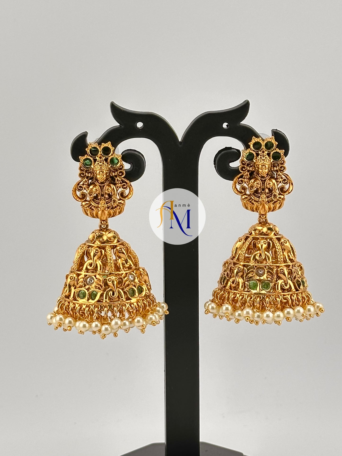 Beautiful temple design with cute elephant motifs with ruby-green stone and white pearl hangings