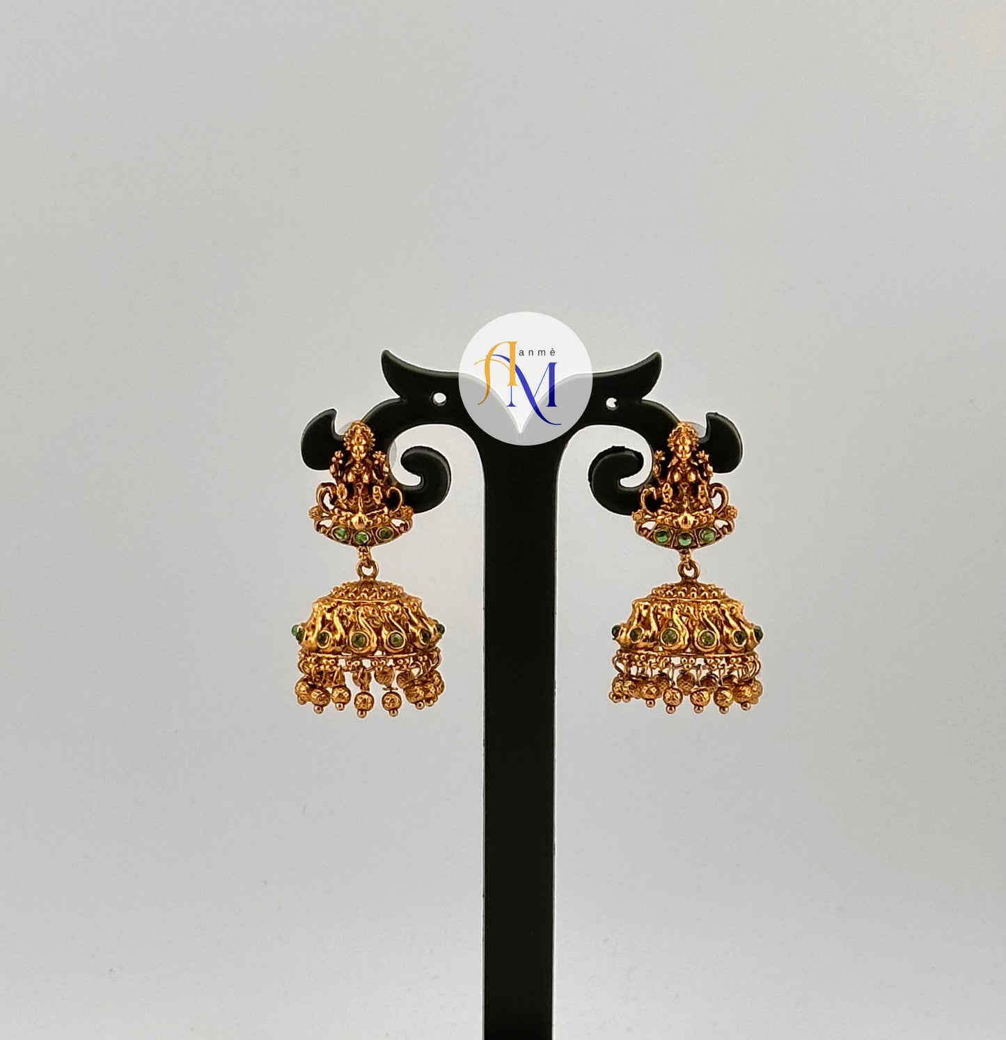 Simple temple design Jhumkas with lakshmi and swan motifs(Available in 4 colors)