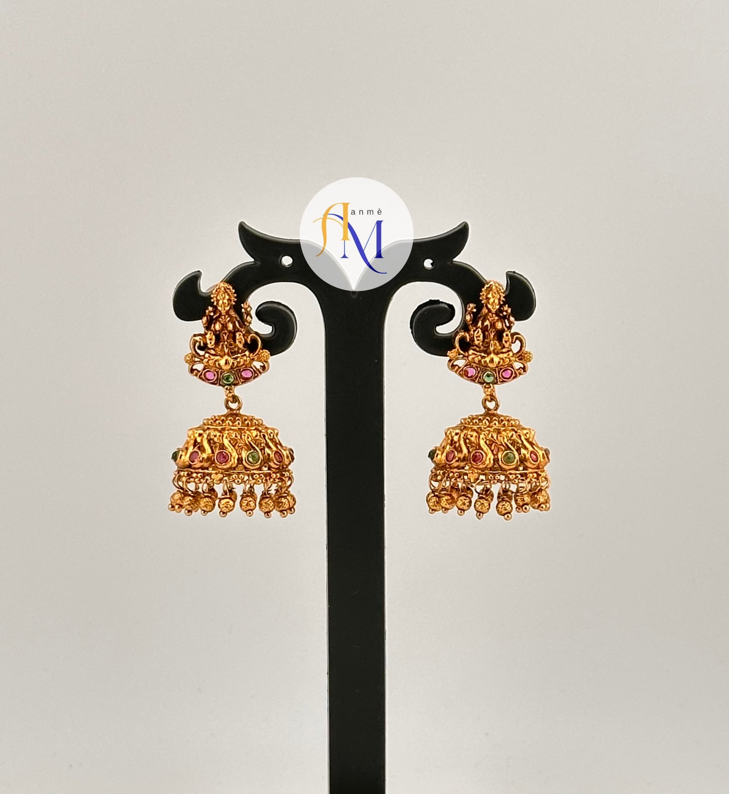 Simple temple design Jhumkas with lakshmi and swan motifs(Available in 4 colors)