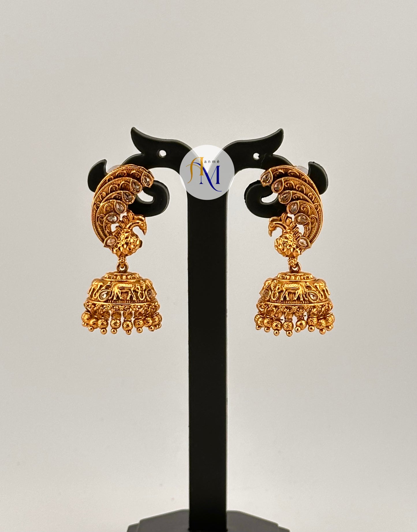 Vibrant Peacock design Jhumkas along with elephant motifs(Available in 2 colors)