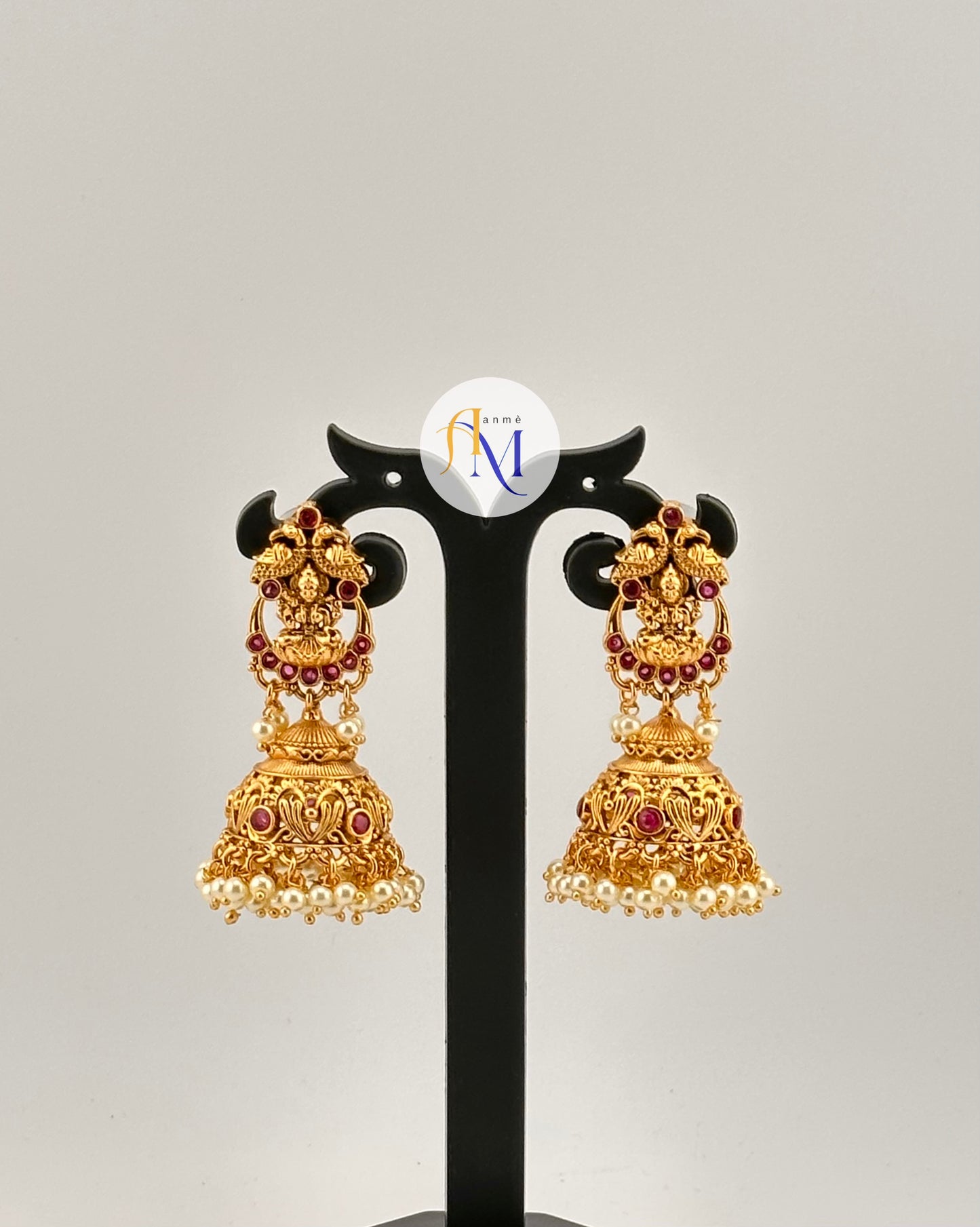 Long Temple design Jhumkas with peacock and white pearl hangings(Available in 2 colors)