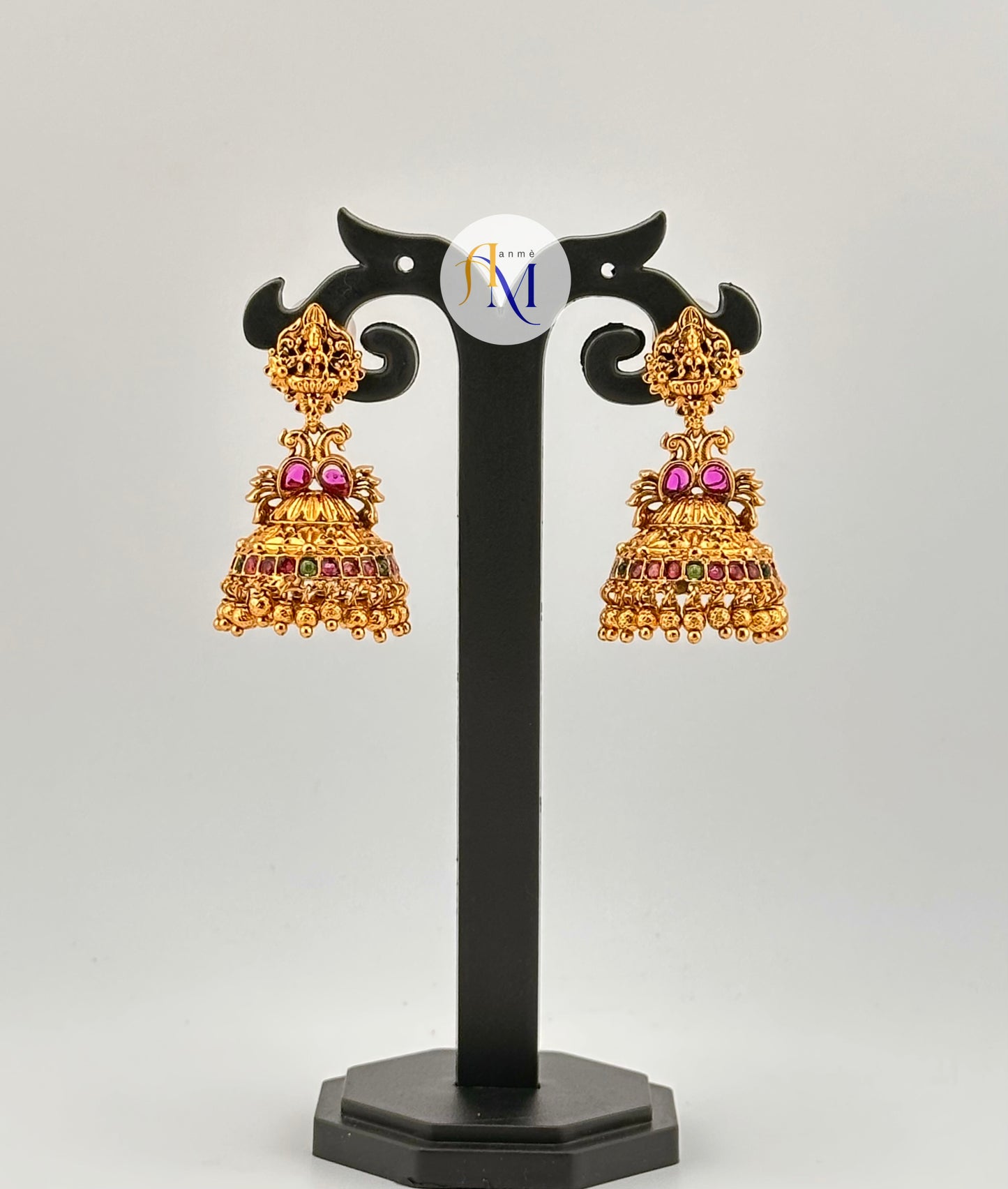 Simple and beautiful temple design Jhumkas with ruby-green stones(Available in 2 colors)
