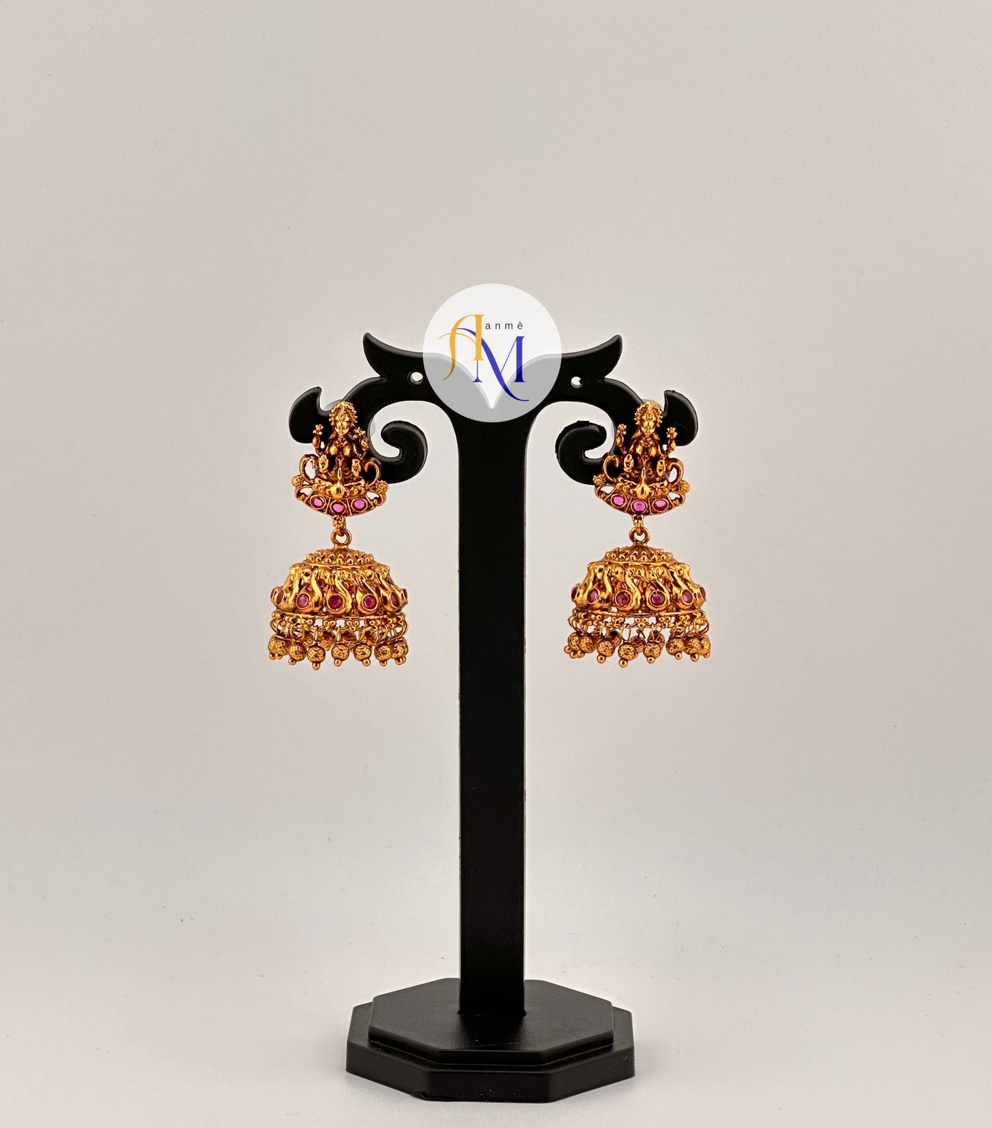 Simple temple design Jhumkas with lakshmi and swan motifs(Available in 4 colors)