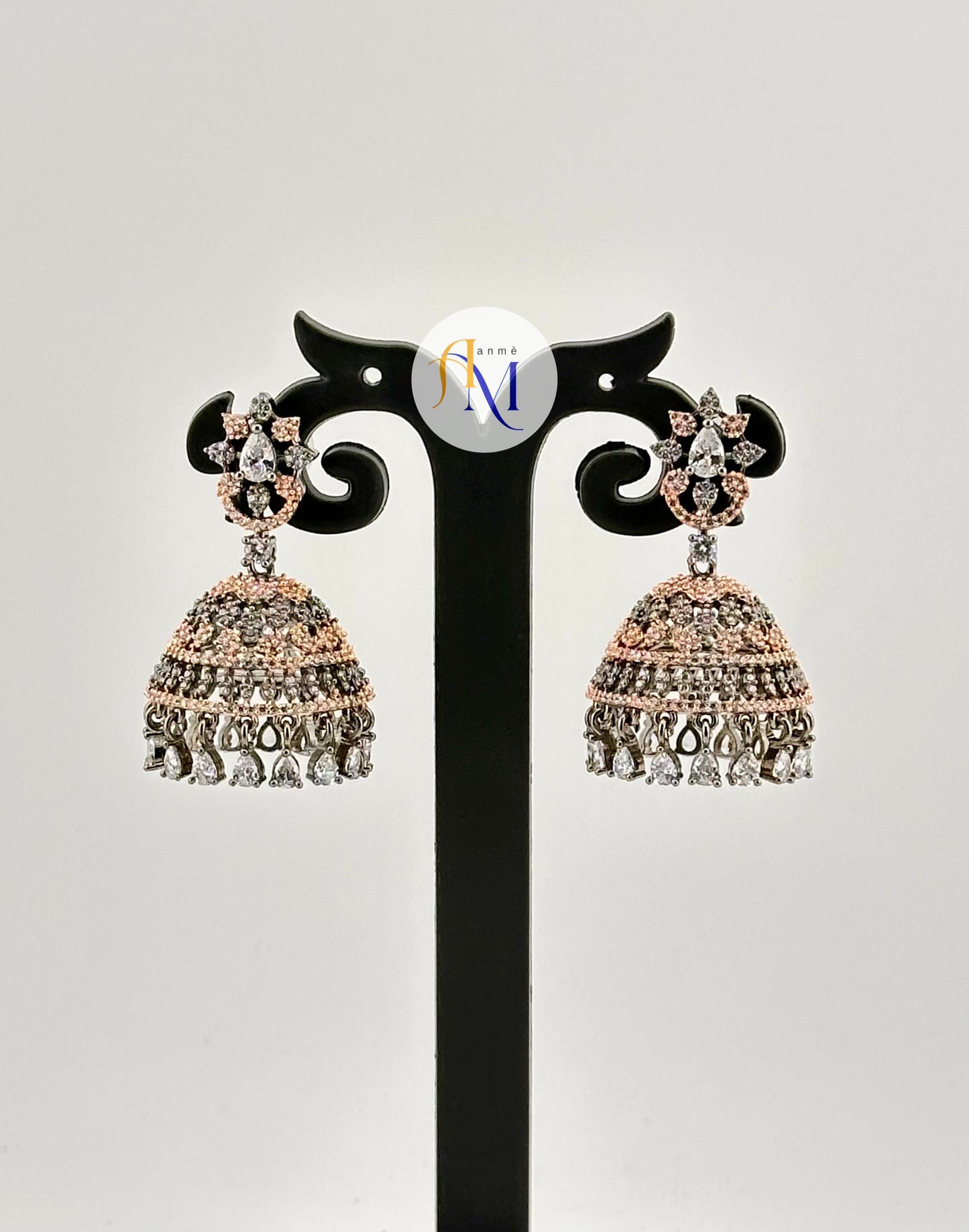 Sparkling black metal jhumka with white stone finishes with rosegold