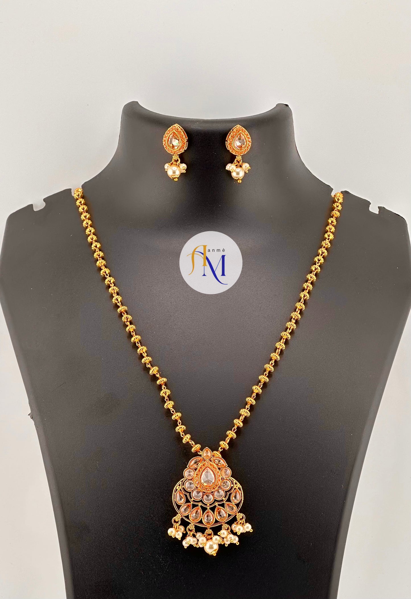 Simple white stone pearl hangings pendant with golden chain haram and cute earrings