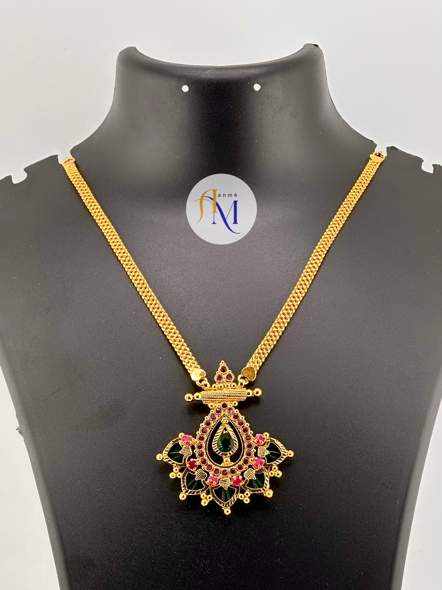 Unique palakka pendant with golden chain necklace