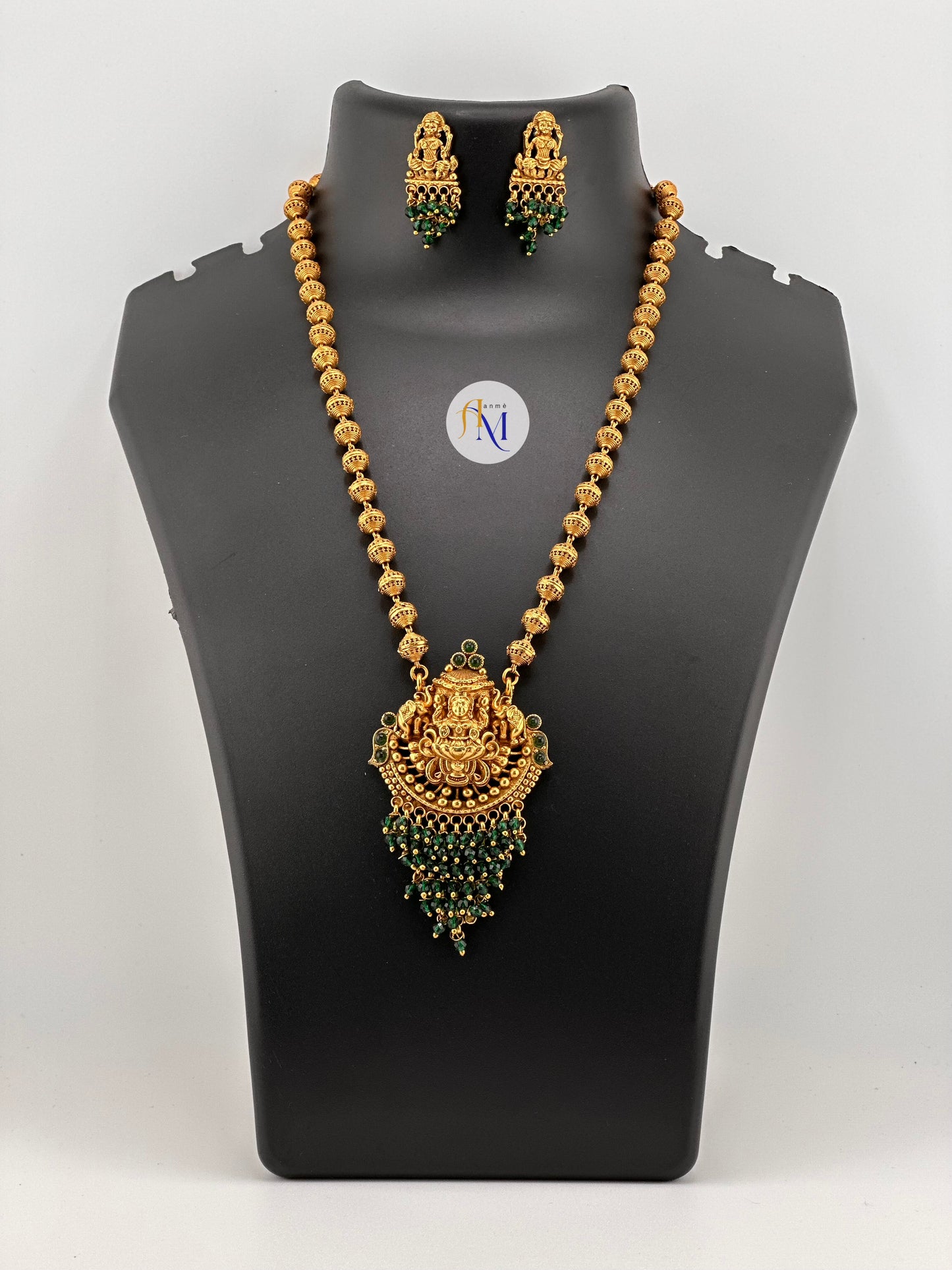 Trending peacock-lakshmi pendant with pearl hangings long haram and earrings(Available in 2 colors)