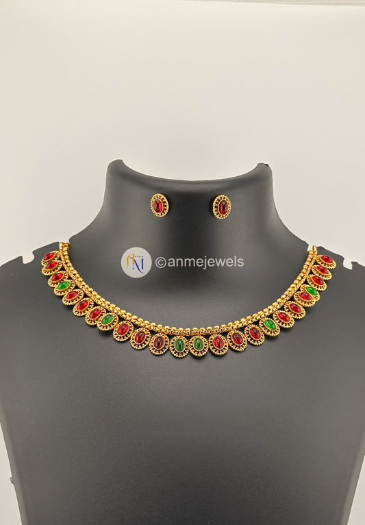 Elegant ruby and green necklace set with ruby earrings