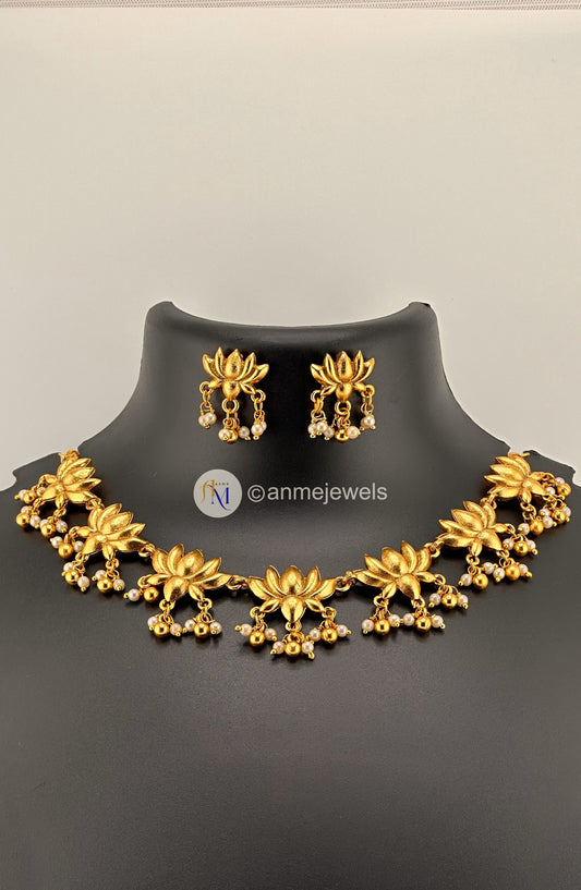 Trending Golden Lotus necklace set with beautiful pearl hangings and earrings