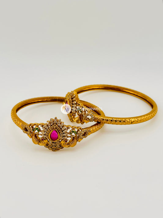Kundan stone matte finish peacock design bangle set