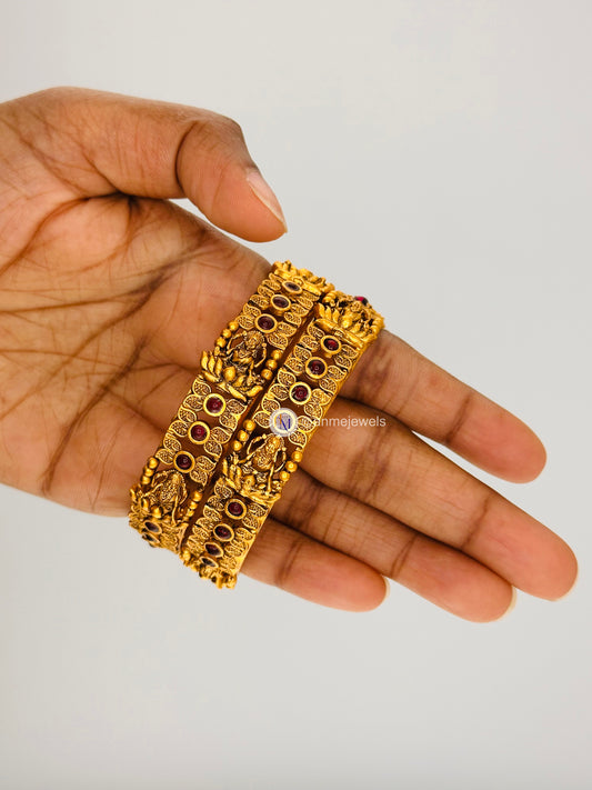 Elegant matte finish ruby floral and goddess lakshmi bangle set