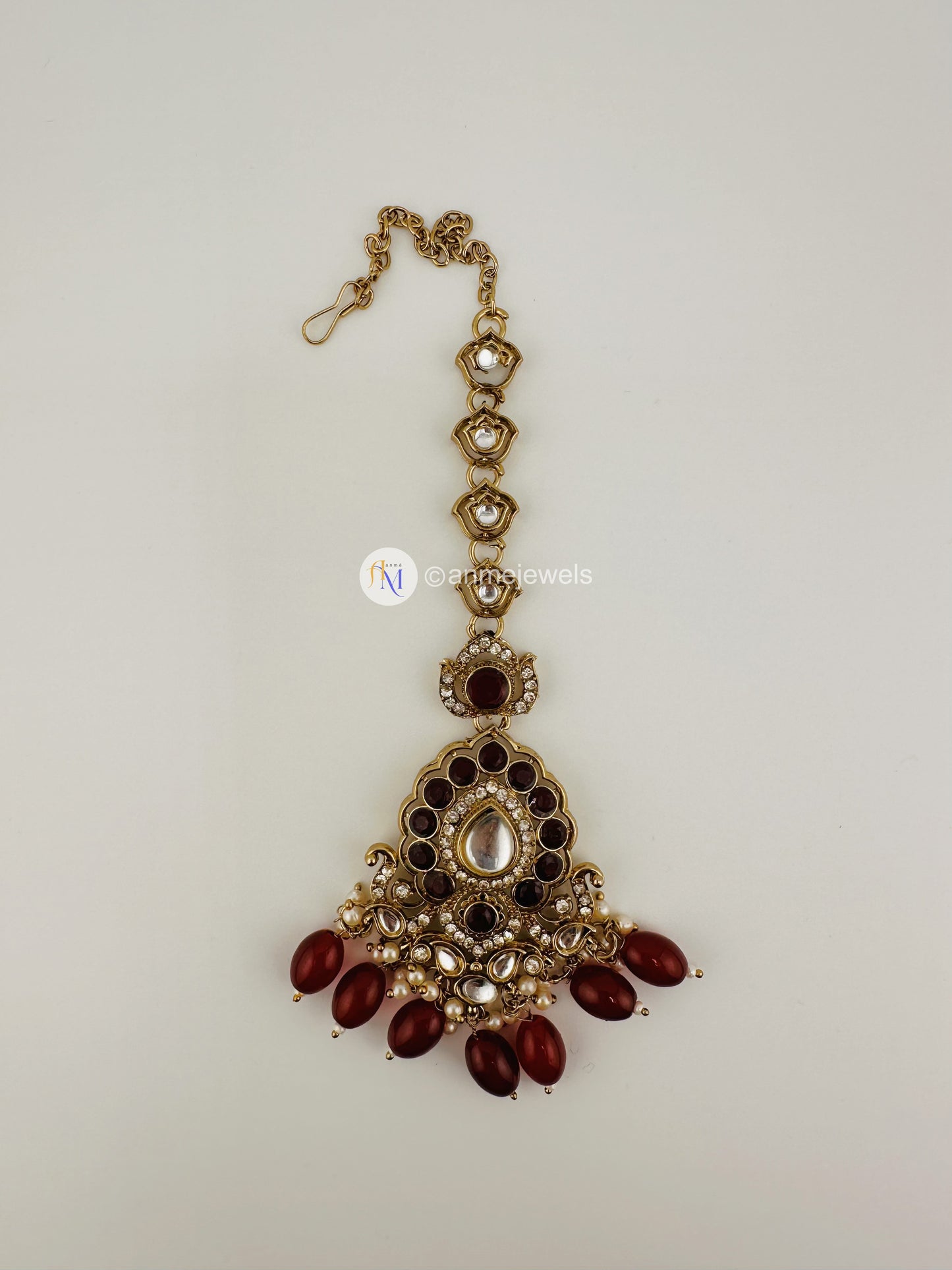 Exclusive Maroon Kundan 10 Piece Bridal Set