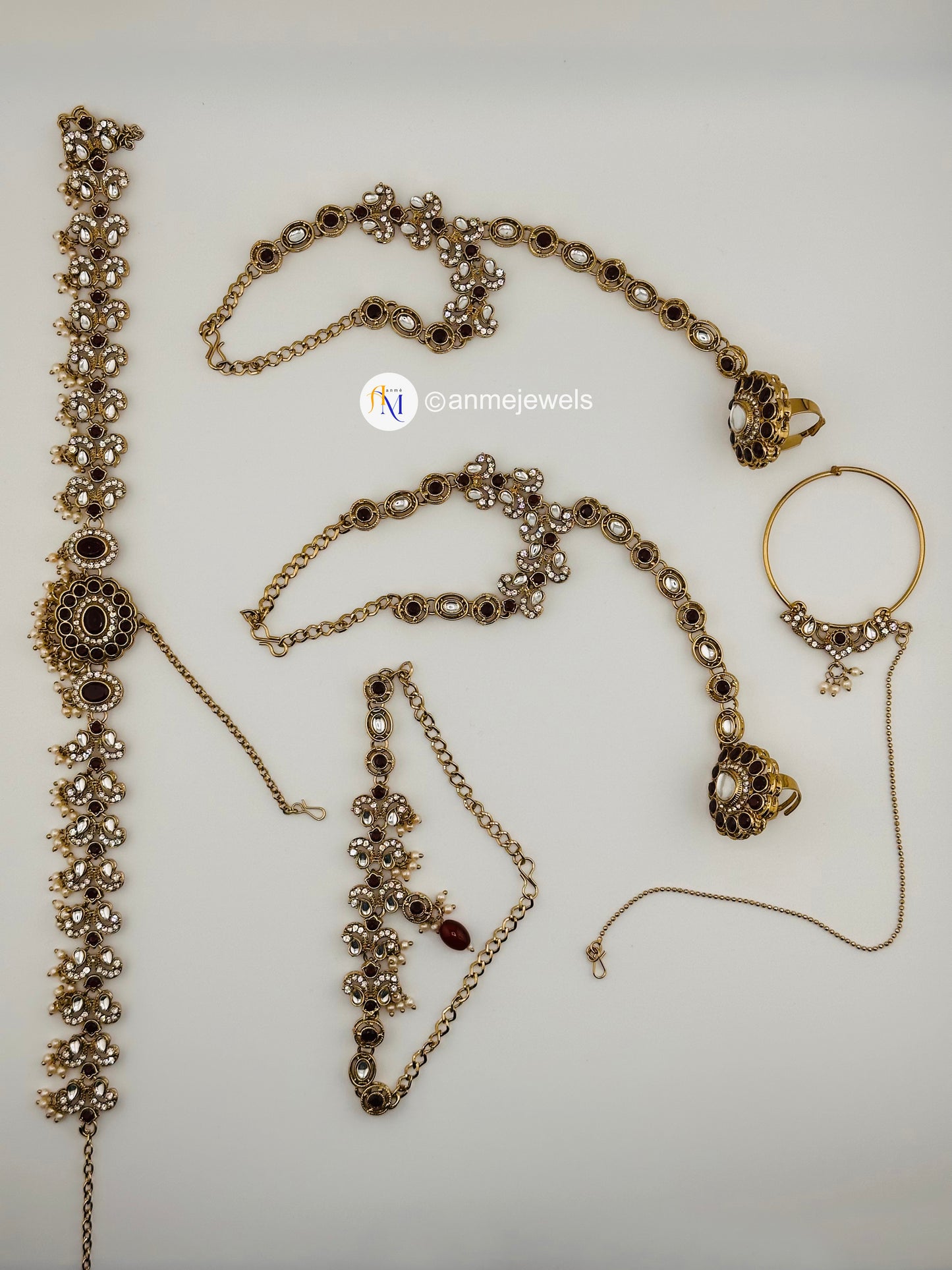 Exclusive Maroon Kundan 10 Piece Bridal Set