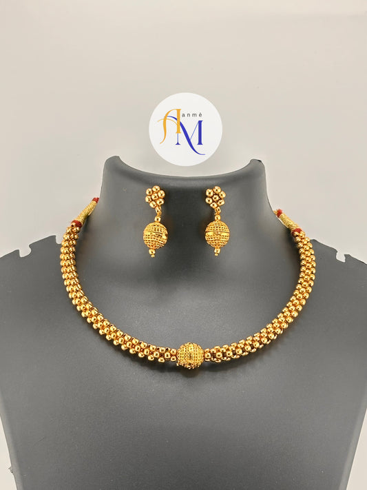 Elegant gold necklace with beautiful hanging earrings