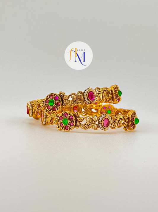 Beautiful Peacock and floral design with ruby-green stone bangles(Set of 2)