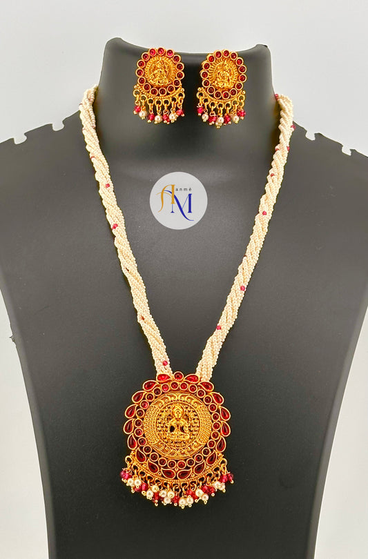 Pretty looking pearl chain long harams with golden lakshmi pendant with earrings(Available in 2 colors)