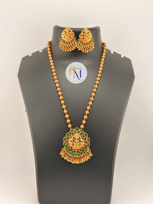 Antique Lakshmi pendant long haram with double layer green stones with beautiful earrings