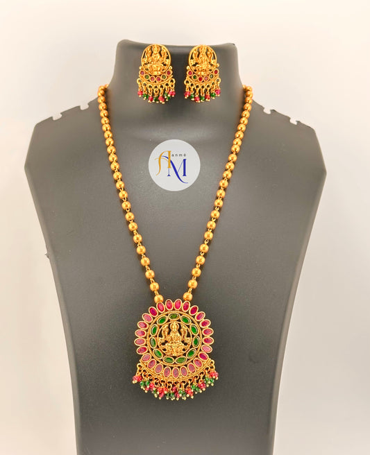 Traditional Lakshmi pendant long haram with Ruby-Green stones and pearl hangings with earrings