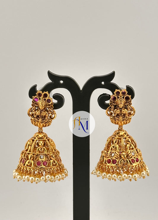Beautiful temple design with cute elephant motifs with ruby-green stone and white pearl hangings