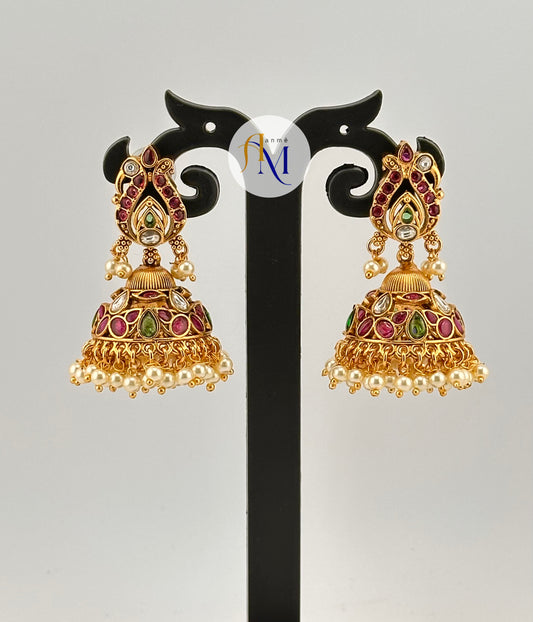 Beautiful multicolor Jhumkas with peacock design and pearl hangings