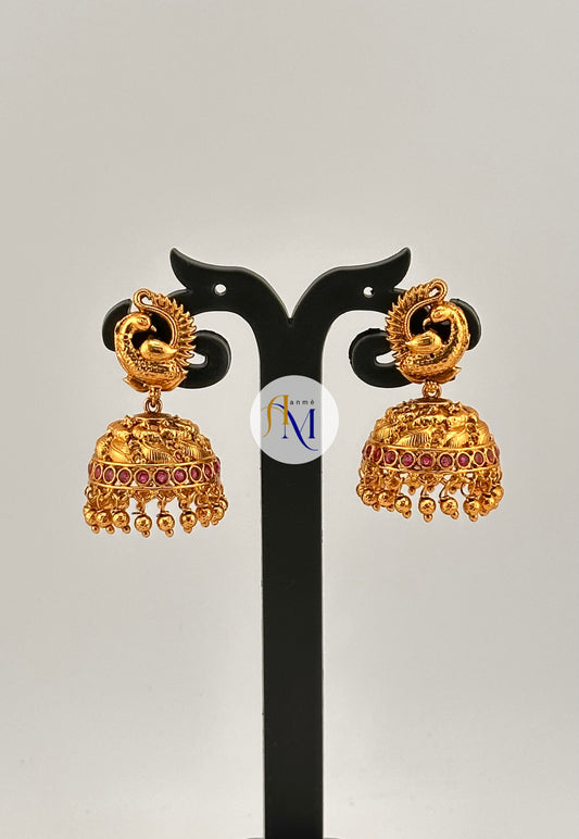 Beautiful peacock design earrings with ruby or green stones