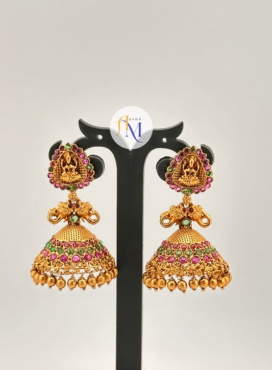 Long Beautiful Temple design Jhumkas with Lakshmi and elephant motifs and ruby-green stones
