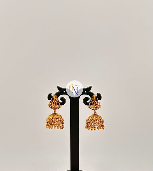 Simple temple design Jhumkas with lakshmi and swan motifs(Available in 4 colors)