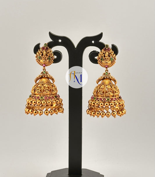 Beautiful long temple design Jhumkas with peacock and ruby-green stones
