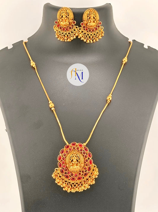 Beautiful Lakshmi pendant with ruby stones and simple golden chain long haram