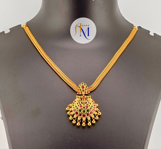 Beautiful single pendant and chain necklace with ruby-green stones