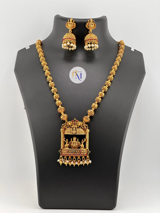 Antique temple pendant with beautiful ball chain long haram with pearl hangings and earrings