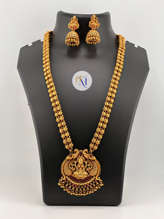 Antique peacock and lakshmi pendant with beautiful pearl hangings long haram and jhumkas