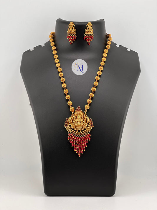 Trending peacock-lakshmi pendant with pearl hangings long haram and earrings(Available in 2 colors)