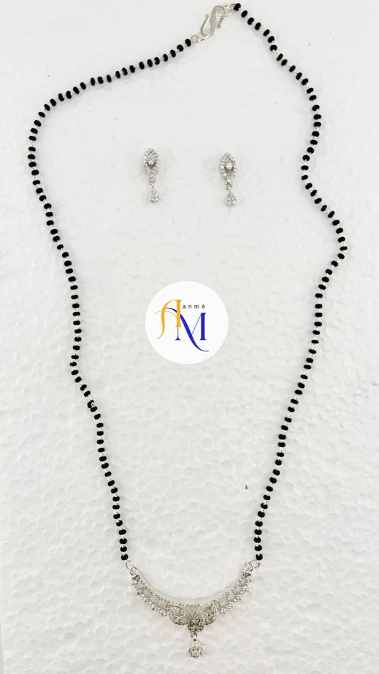 Simple classic beads mangalsutra with silver pendant with stone work and cute earrings